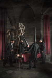 Rembrandt anatomy lesson with coneheads and an elephant skeleton 